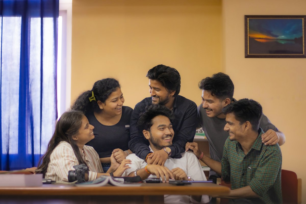 Indian students studying together with a mentor