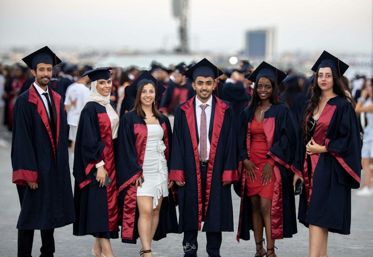 Medical graduates in gowns after completing their degree