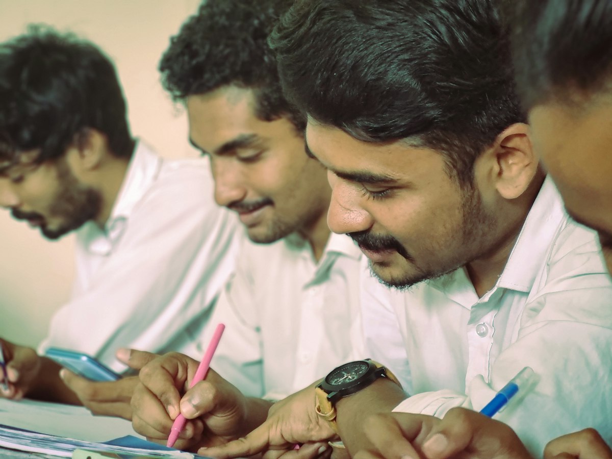 Indian MBBS students taking notes during a subject class